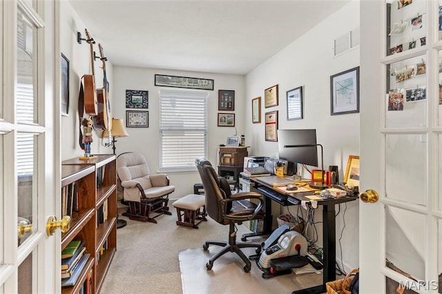 view of carpeted office space