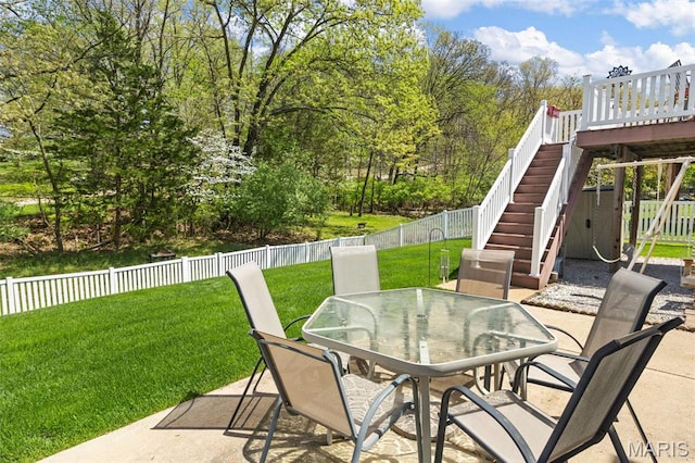 view of patio / terrace with outdoor dining space and stairway