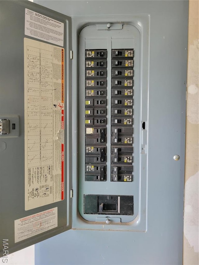 utility room with electric panel