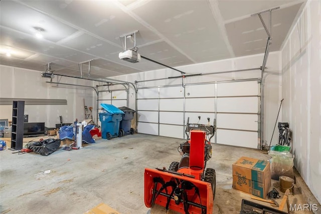 garage featuring a garage door opener