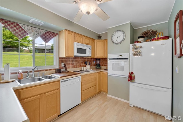 14710 Arbre Ln, Florissant, MO 63034 - kitchen with white appliances, a sink, light wood-type flooring, backsplash, and light brown cabinetry