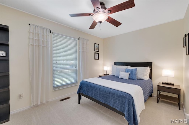 14710 Arbre Ln, Florissant, MO 63034 - carpeted bedroom featuring baseboards and ceiling fan