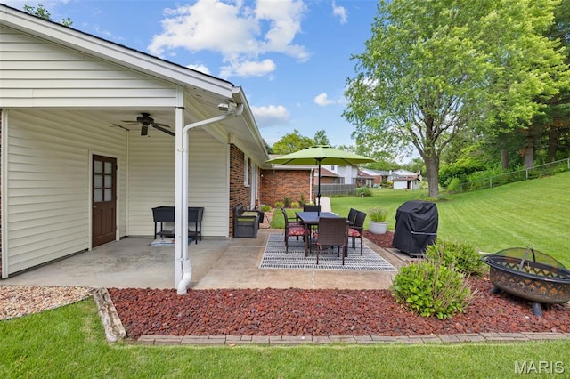 14710 Arbre Ln, Florissant, MO 63034 - view of patio / terrace with an outdoor fire pit, grilling area, and a ceiling fan