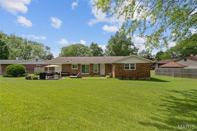 14710 Arbre Ln, Florissant, MO 63034 - back of property featuring brick siding, a patio, and entry steps
