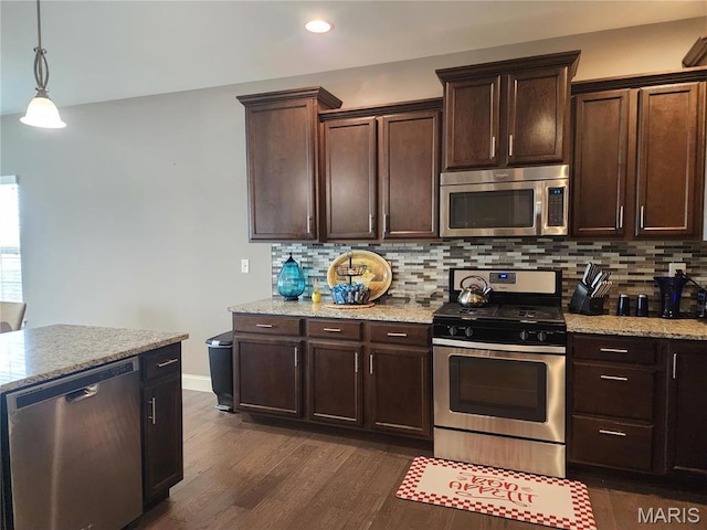 kitchen featuring stainless steel appliances, dark wood-style floors, decorative backsplash, dark brown cabinets, and recessed lighting