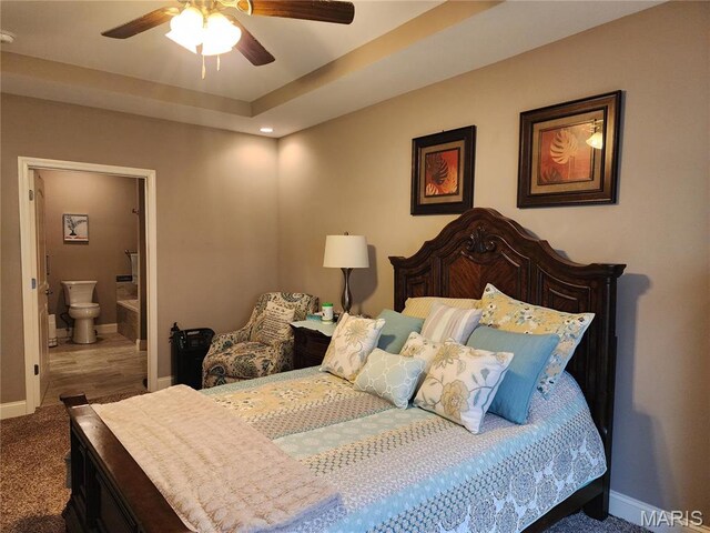 carpeted bedroom with baseboards, ensuite bath, ceiling fan, and recessed lighting