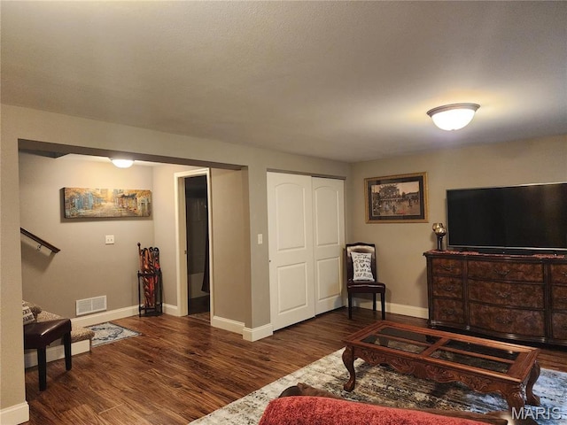 7466 Clarence Ct, Glen Carbon, IL 62034 - living area featuring wood finished floors and baseboards