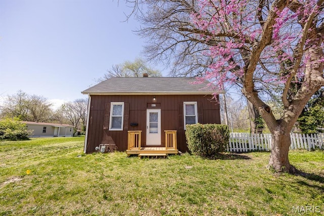 917 N Church St, Belleville, IL 62220 - view of front of home featuring roof with shingles and a chimney