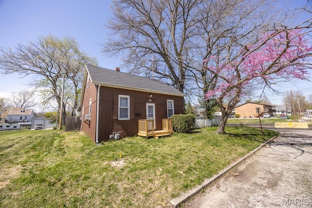 917 N Church St, Belleville, IL 62220 - view of property exterior with a chimney and roof with shingles