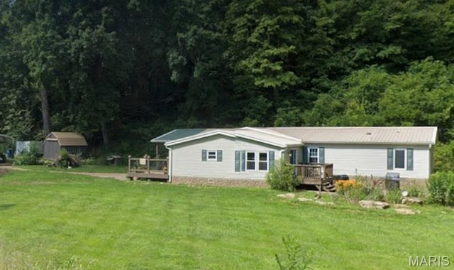 119 Bethel Rd, Hawk Point, MO 63349 - back of house featuring a deck, a yard, and a forest view