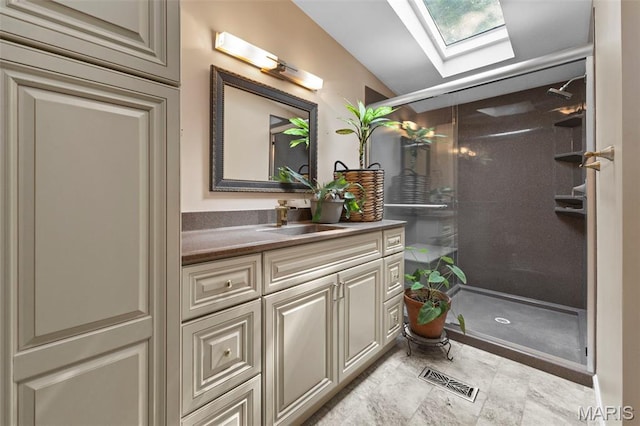 119 Bethel Rd, Hawk Point, MO 63349 - full bathroom featuring a skylight, vanity, and a stall shower