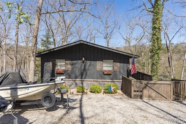 13224 Crow Ln, Saint Genevieve, MO 63670 - view of side of home featuring fence and a gate