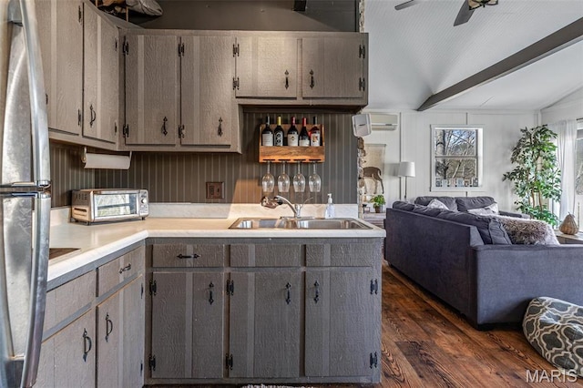 13224 Crow Ln, Saint Genevieve, MO 63670 - kitchen with a sink, open floor plan, dark wood-style floors, lofted ceiling, and a ceiling fan
