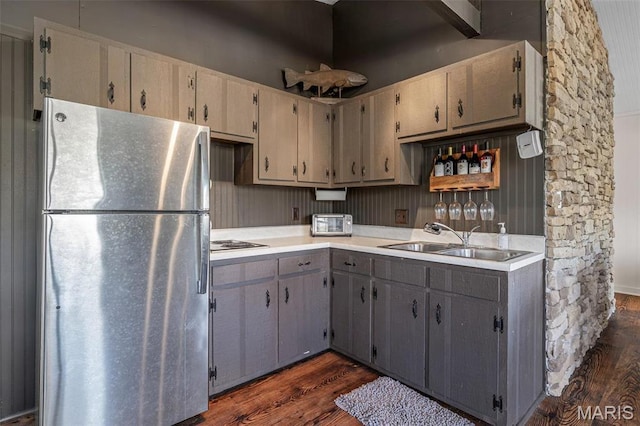 13224 Crow Ln, Saint Genevieve, MO 63670 - kitchen featuring appliances with stainless steel finishes, a sink, dark wood-type flooring, and gray cabinetry