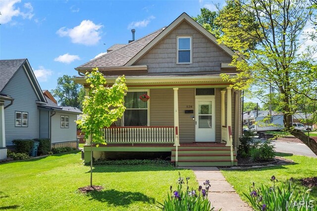 528 Hillsboro Ave, Edwardsville, IL 62025 - view of front of house featuring covered porch, a front lawn, and roof with shingles
