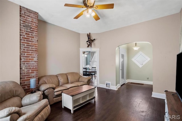 528 Hillsboro Ave, Edwardsville, IL 62025 - living area with a ceiling fan, dark wood-style flooring, and baseboards