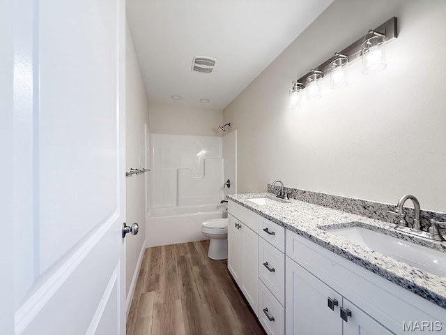 201 Ariel Ct, Desloge, MO 63601 - bathroom with wood finished floors, double vanity, and bathing tub / shower combination