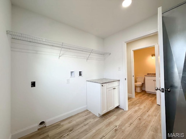 201 Ariel Ct, Desloge, MO 63601 - laundry area with hookup for an electric dryer, light wood-style flooring, and washer hookup