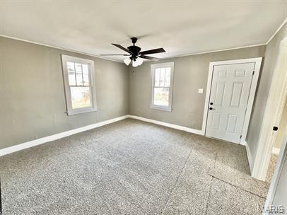 228 A Pine St, Sullivan, MO 63080 - empty room with healthy amount of natural light, baseboards, and ceiling fan