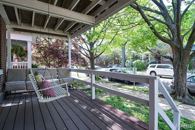 4207 Connecticut St, Saint Louis, MO 63116 - wooden deck featuring an outdoor living space