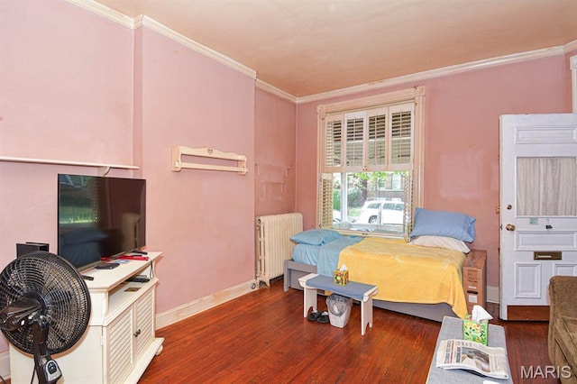 4207 Connecticut St, Saint Louis, MO 63116 - bedroom with radiator heating unit, hardwood / wood-style floors, crown molding, and baseboards