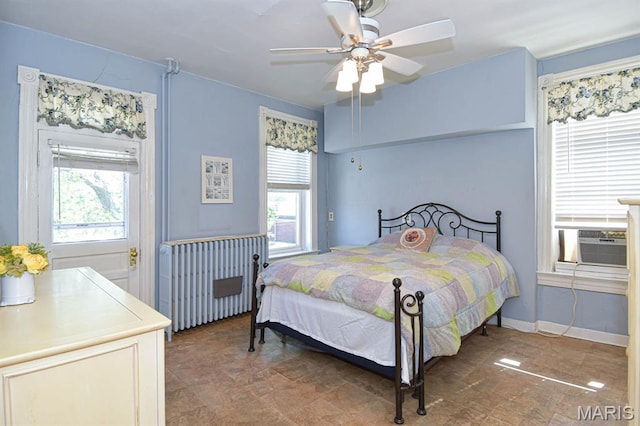 4207 Connecticut St, Saint Louis, MO 63116 - bedroom with cooling unit, stone finish flooring, ceiling fan, and baseboards