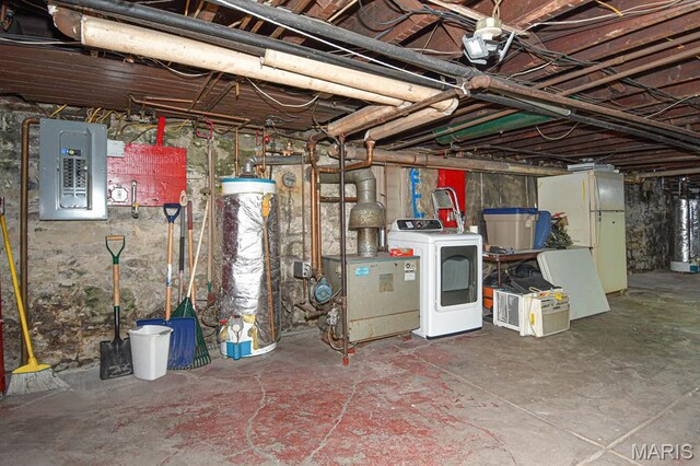 4207 Connecticut St, Saint Louis, MO 63116 - unfinished below grade area featuring washer / dryer, electric panel, gas water heater, and freestanding refrigerator