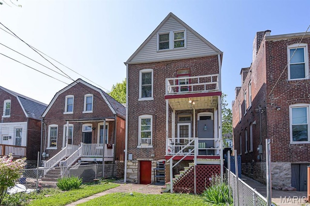 4207 Connecticut St, Saint Louis, MO 63116 - view of front of house with brick siding, stairway, and a porch