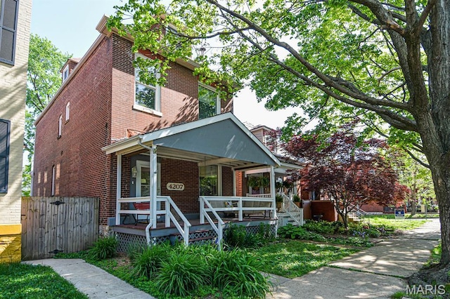 4207 Connecticut St, Saint Louis, MO 63116 - view of front of home featuring brick siding and covered porch