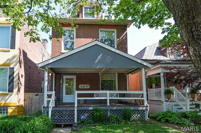 4207 Connecticut St, Saint Louis, MO 63116 - american foursquare style home with brick siding and covered porch