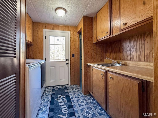 8325 Maple Ln, Dittmer, MO 63023 - laundry area featuring cabinet space, independent washer and dryer, a heating unit, and wood walls