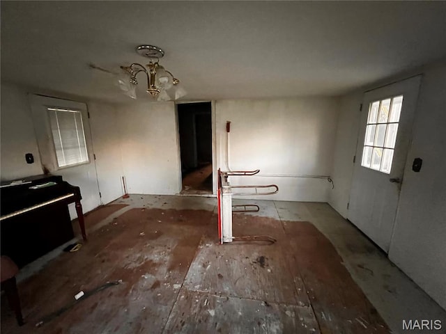 410 N Jackson St, Farmington, MO 63640 - unfurnished dining area with a chandelier