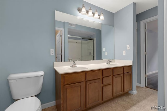 9744 Bexley Station Dr Unit F, Saint Louis, MO 63123 - bathroom featuring double vanity, a shower with door, and tile patterned flooring