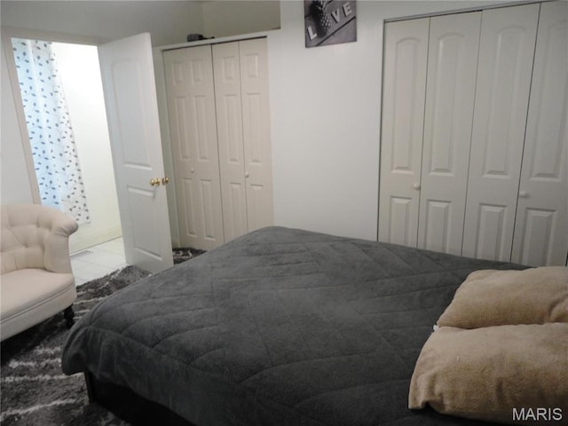 6518 Chamberlain Ave, Saint Louis, MO 63130 - bedroom featuring multiple closets