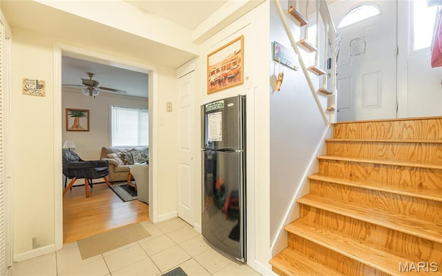 1109 Pawnee Dr, Cuba, MO 65453 - staircase with tile patterned flooring and a ceiling fan