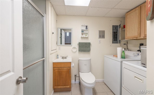 1109 Pawnee Dr, Cuba, MO 65453 - bathroom with washer and clothes dryer, vanity, a drop ceiling, electric panel, and tile patterned floors