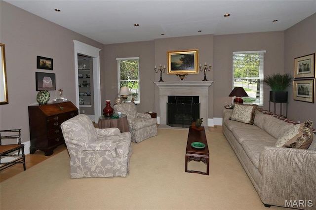 7788 Pershing Ave, Clayton, MO 63105 - living room with a fireplace with flush hearth and baseboards