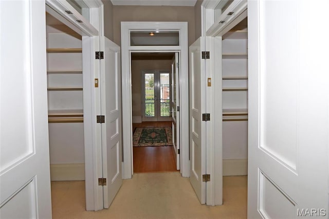 7788 Pershing Ave, Clayton, MO 63105 - corridor featuring french doors and elevator