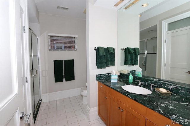 7788 Pershing Ave, Clayton, MO 63105 - full bathroom with tile patterned flooring, a stall shower, vanity, and toilet