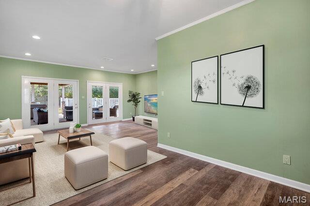 433 Snipes Dr, Saint Charles, MO 63303 - living room with french doors, wood finished floors, ornamental molding, and recessed lighting