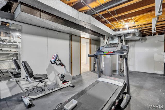 433 Snipes Dr, Saint Charles, MO 63303 - workout area featuring gas water heater
