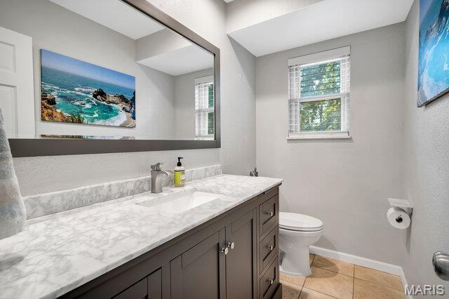 433 Snipes Dr, Saint Charles, MO 63303 - bathroom with vanity and tile patterned floors