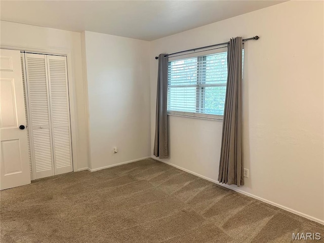 433 Snipes Dr, Saint Charles, MO 63303 - unfurnished bedroom featuring carpet flooring and a closet
