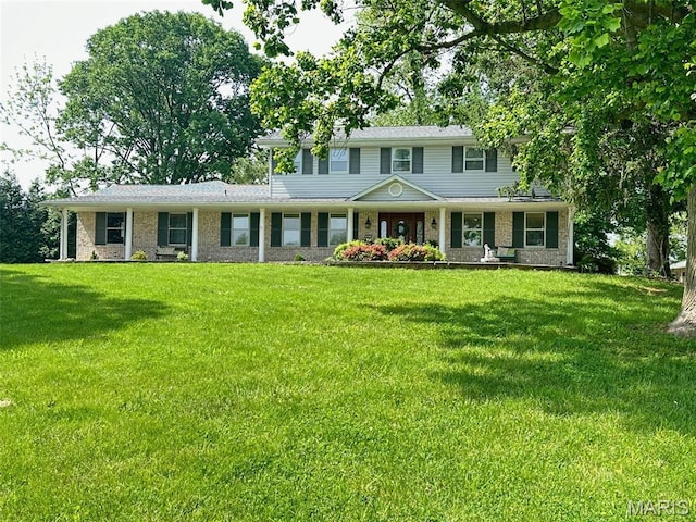 433 Snipes Dr, Saint Charles, MO 63303 - view of front facade with a front lawn and brick siding