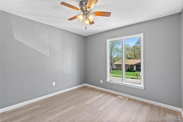 1958 Cathedral Hill Dr, Saint Louis, MO 63138 - empty room featuring wood finished floors, baseboards, and ceiling fan