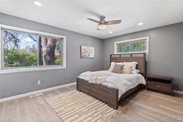 1958 Cathedral Hill Dr, Saint Louis, MO 63138 - bedroom with baseboards, wood finished floors, recessed lighting, and ceiling fan