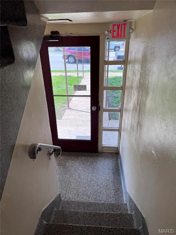 doorway with baseboards