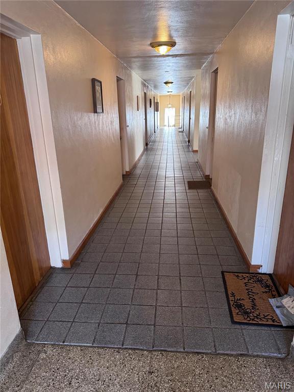 hallway with baseboards