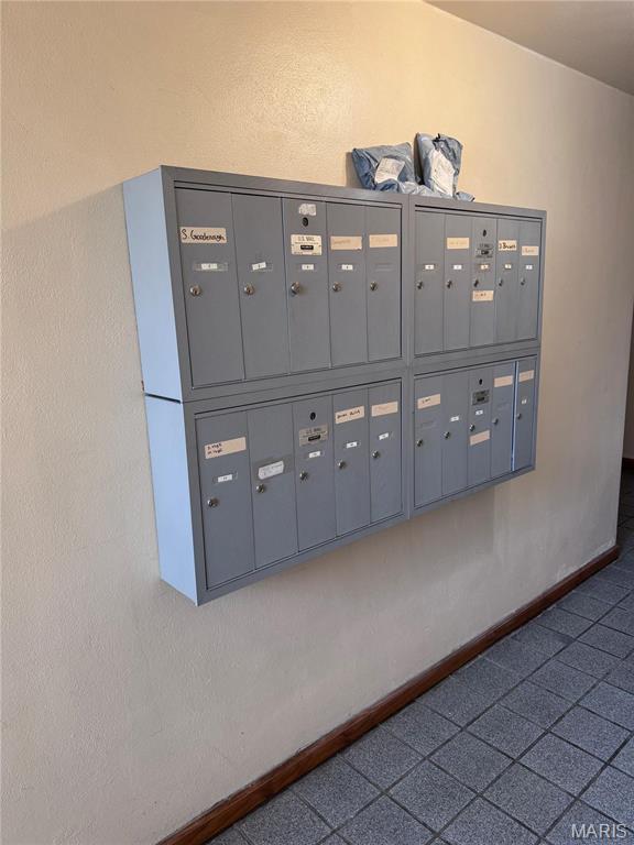 detailed view of mail area and baseboards