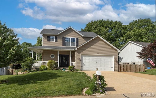 2122 Birchwood Dr, Barnhart, MO 63012 - traditional-style house featuring covered porch, concrete driveway, and a garage